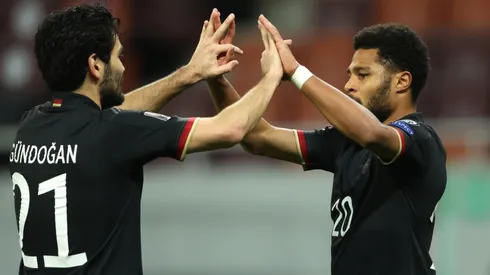 Serge Gnabry (right) of Germany celebrates with team mate Ilkay Gundogan (left). (Getty).jpg