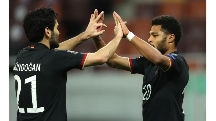 Serge Gnabry (right) of Germany celebrates with team mate Ilkay Gundogan (left). (Getty).jpg
