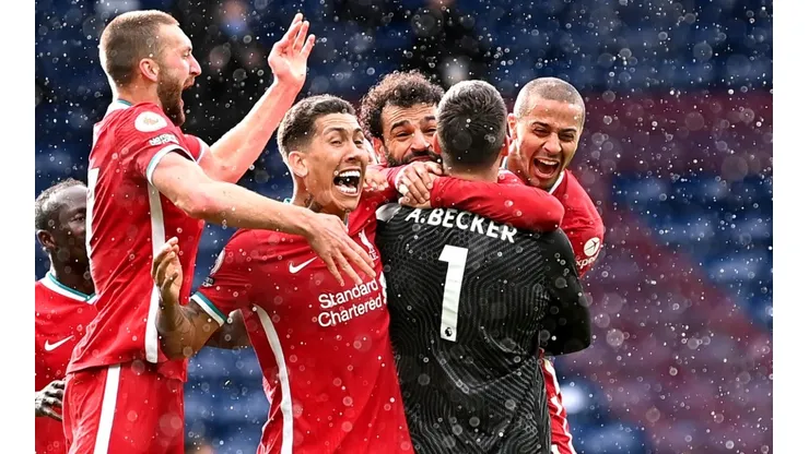 Alisson of Liverpool celebrates with teammates. (Getty).jpg