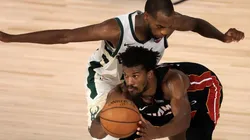 Khris Middleton guarding Jimmy Butler. (Getty)