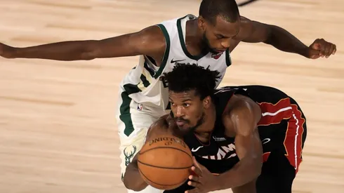 Khris Middleton guarding Jimmy Butler. (Getty)