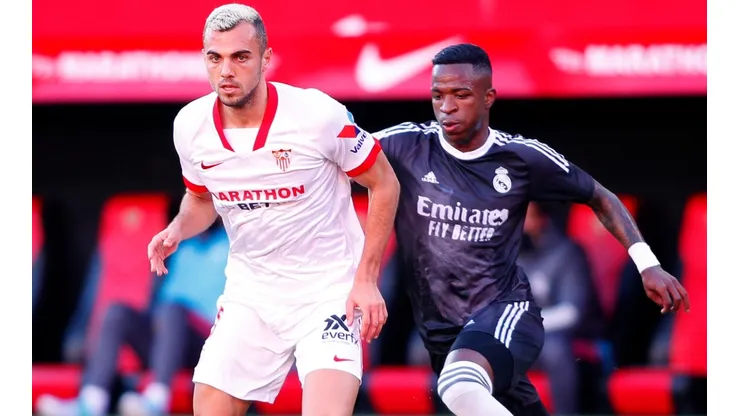 Joan Jordan of Sevilla (left) is challenged by Vinicius Junior of Real Madrid (right). (Getty)