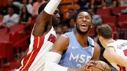 Josh Okogie (right) of the Minnesota Timberwolves drives to the basket against Kendrick Nunn (left) of the Miami Heat. (Getty)