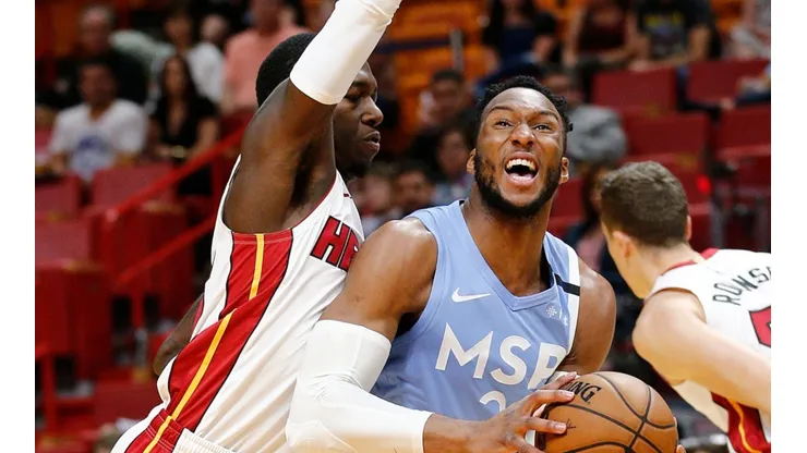 Josh Okogie (right) of the Minnesota Timberwolves drives to the basket against Kendrick Nunn (left) of the Miami Heat. (Getty)