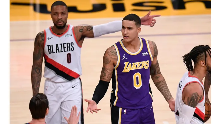 Kyle Kuzma (right) of the Los Angeles Lakers and Damian Lillard (left) of the Portland Trail Blazers. (Getty)