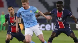 Kevin de Bruyne of Manchester City (center) is challenged by Angel di Maria (left) and Idrissa Gueye (right) of Paris Saint-Germain. (Getty)
