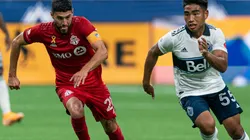 Michael Baldisimo (right) of the Vancouver Whitecaps and Jonathan Osorio (left) of the Toronto FC. (Getty)