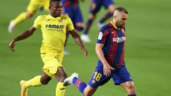 Jordi Alba of Barcelona (right) is put under pressure by Samuel Chukwueze of Villarreal (left). (Getty)
