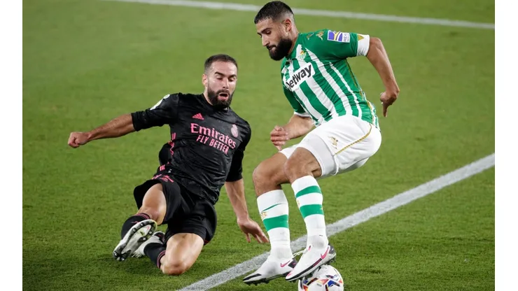 Nabil Fekir (right) of Real Betis is challenged by Daniel Carvajal (left) of Real Madrid. (Getty)