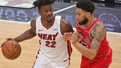 Jimmy Butler (left) of the Miami Heat moves against Denzel Valentine (right) of the Chicago Bulls. (Getty)
