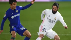 Isco of Real Madrid (right) is closed down by Takefusa Kubo of Getafe (left). (Getty)