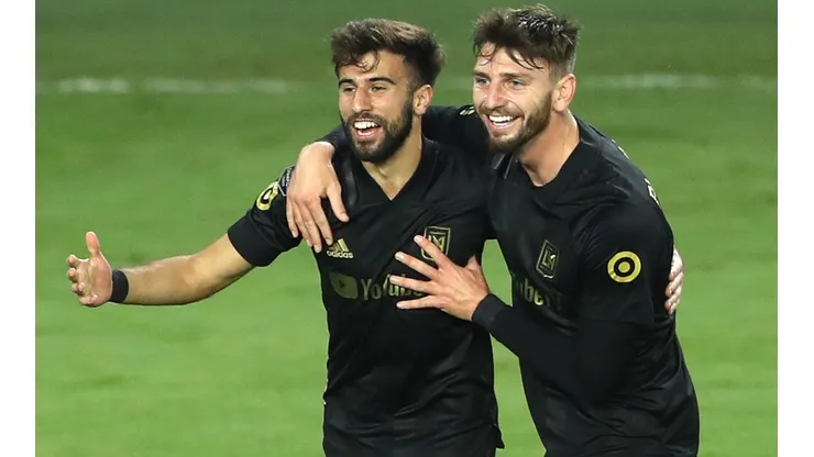 Diego Rossi (left) and Jordan Harvey (right) of Los Angeles FC celebrate a goal. (Getty)