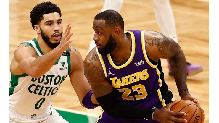 Jayson Tatum (left) of the Boston Celtics defends LeBron James (right) of the Los Angeles Lakers. (Getty)