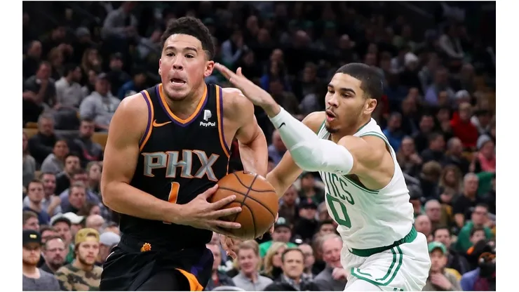 Devin Booker & Jayson Tatum. (Getty)