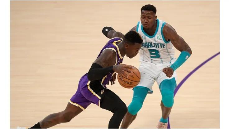 Dennis Schroder & Terry Rozier. (Getty)