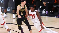 Kendrick Nunn (right) of the Miami Heat drives the ball against Alex Caruso (left) of the Los Angeles Lakers.