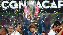 Matias Almeyda of Chivas celebrates with the 2018 CONCACAF Champions League Trophy.