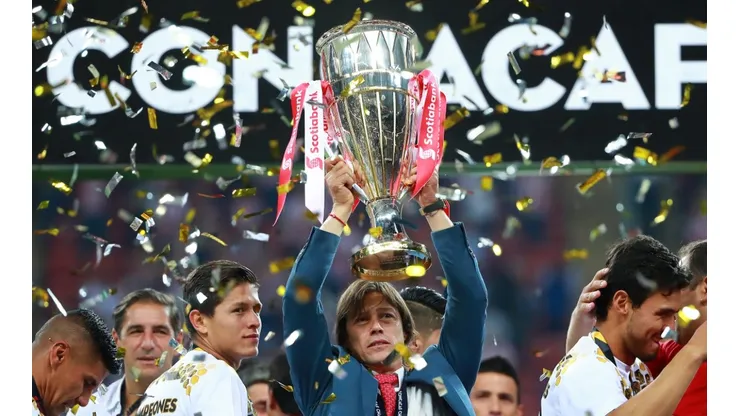 Matias Almeyda of Chivas celebrates with the 2018 CONCACAF Champions League Trophy.