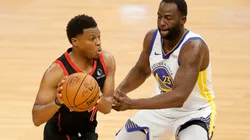 Kyle Lowry (left) of the Toronto Raptors is guarded by Draymond Green (right) of the Golden State Warriors.