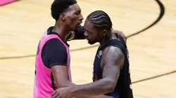 Bam Adebayo (left) of the Miami Heat hugs Julius Randle (right) of the New York Knicks.