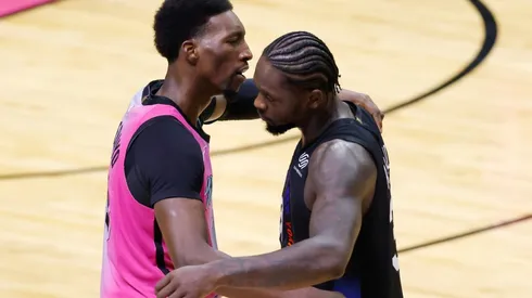 Bam Adebayo (left) of the Miami Heat hugs Julius Randle (right) of the New York Knicks.