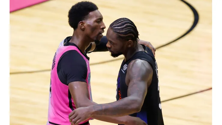 Bam Adebayo (left) of the Miami Heat hugs Julius Randle (right) of the New York Knicks.