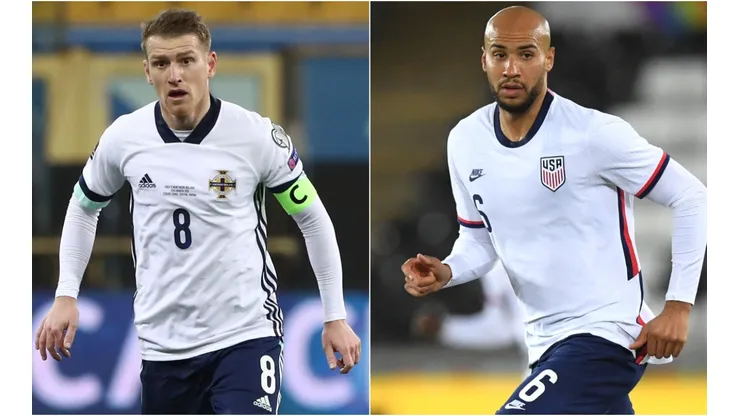 Steven Davis (left) of Northern Ireland and John Brooks (right) of the USA.