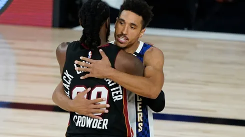 Jae Crowder (left) of the Miami Heat embraces Malcolm Brogdon (right) of the Indiana Pacers