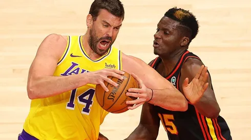 Marc Gasol (left) of the Los Angeles Lakers drives against Clint Capela (right) of the Atlanta Hawks. (Getty)