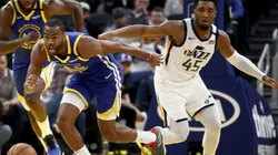 Alec Burks (right) of the Golden State Warriors goes for the ball after he stole it from Donovan Mitchell (left) of the Utah Jazz. (Getty).jpg