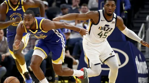 Alec Burks (right) of the Golden State Warriors goes for the ball after he stole it from Donovan Mitchell (left) of the Utah Jazz. (Getty).jpg