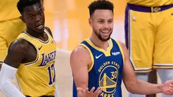 Stephen Curry (right) of the Golden State Warriors reacts after a foul on Dennis Schroder (left) of the Los Angeles Lakers. (Getty)