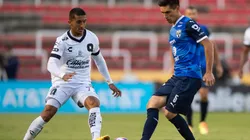 Kevin Ramirez (left) of Queretaro fights for the ball with Claudio Kranevitter (right) of Monterrey. (Getty)
