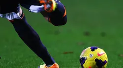 A soccer player kicks the Nike Incyte match ball upfield during a Premier League match. (Getty)