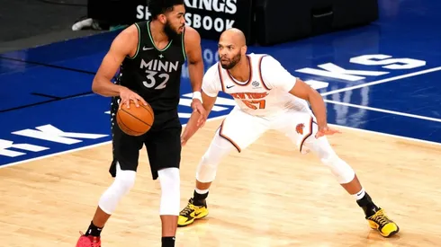 Taj Gibson guarding Karl-Anthony Towns. (Getty)
