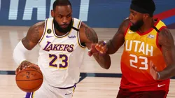 LeBron James (left) of the Los Angeles Lakers drives against Royce O'Neale (right) of the Utah Jazz. (Getty)