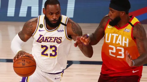 LeBron James (left) of the Los Angeles Lakers drives against Royce O'Neale (right) of the Utah Jazz. (Getty)