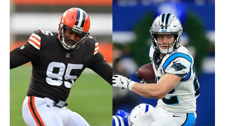Myles Garrett (left) & Christian McCaffrey. (Getty)