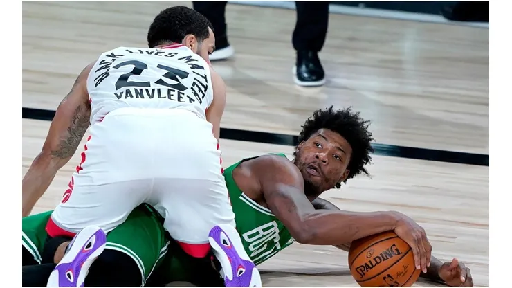 Fred VanVleet & Marcus Smart. (Getty)