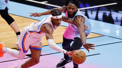 SShai Gilgeous-Alexander (left) of the Oklahoma City Thunder and Precious Achiuwa (right) of the Miami Heat. (Getty)