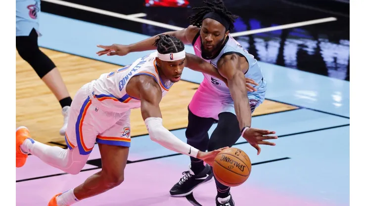 SShai Gilgeous-Alexander (left) of the Oklahoma City Thunder and Precious Achiuwa (right) of the Miami Heat. (Getty)