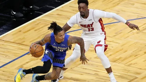 Markelle Fultz #20 of the Orlando Magic dribbles past Bam Adebayo #13 of the Miami Heat at Amway Center on December 23, 2020 in Orlando, Florida. (Getty)