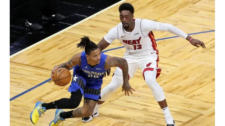 Markelle Fultz #20 of the Orlando Magic dribbles past Bam Adebayo #13 of the Miami Heat at Amway Center on December 23, 2020 in Orlando, Florida. (Getty)