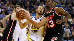 Stephen Curry vs. Bam Adebayo. (Getty)