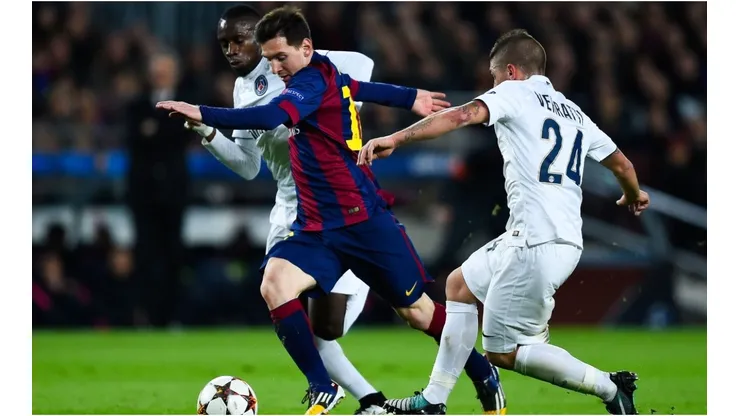 Lionel Messi getting past Marco Verrati. (Getty)