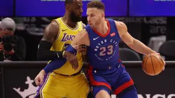 Blake Griffin (right) of the Detroit Pistons tries to get around LeBron James (left) of the Los Angeles Lakers. (Getty)