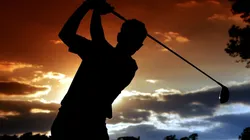 Luke Donald of England hits a tee shot on the 15th hole during the third round of The Masters