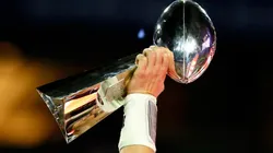 Tom Brady of the New England Patriots celebrates holding the Vince Lombardi Trophy in 2015. (Getty)