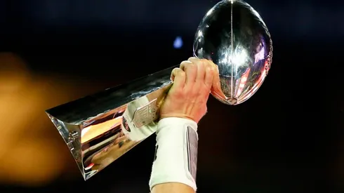 Tom Brady of the New England Patriots celebrates holding the Vince Lombardi Trophy in 2015. (Getty)