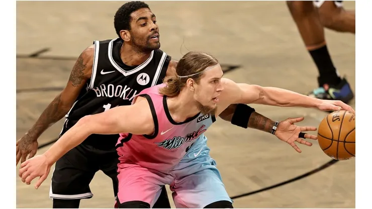 Kyrie Irving of Brooklyn Nets & Kelly Olynyk of Miami Heat. (Getty)